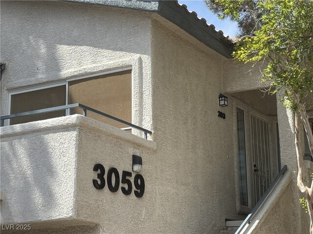 3059 Key Largo Dr Unit 203, Las Vegas, NV 89120 - view of side of home with stucco siding