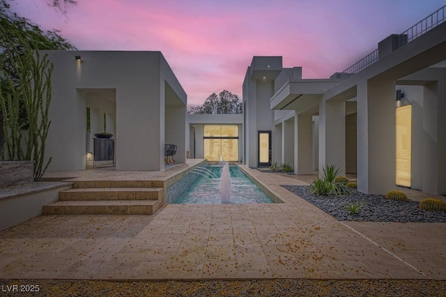 8525 W Verde Way, Las Vegas, NV 89149 - pool at dusk with a patio and an outdoor pool