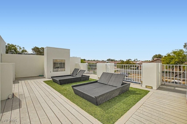 8525 W Verde Way, Las Vegas, NV 89149 - wooden deck with a glass covered fireplace