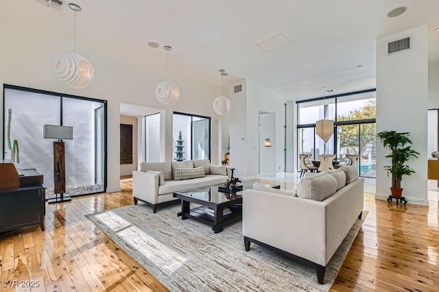 8525 W Verde Way, Las Vegas, NV 89149 - living area featuring light wood finished floors and a high ceiling