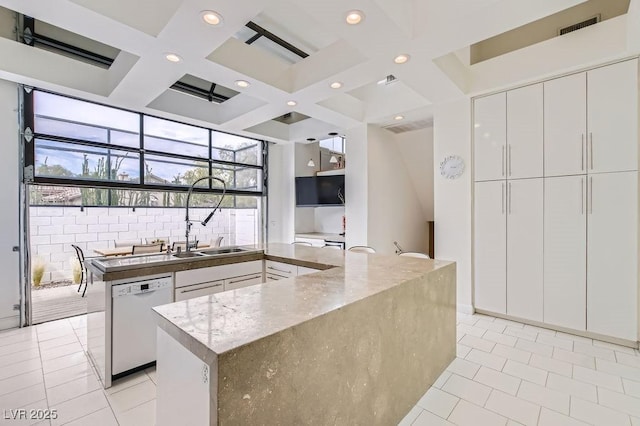 8525 W Verde Way, Las Vegas, NV 89149 - kitchen featuring dishwasher, coffered ceiling, modern cabinets, recessed lighting, and stone countertops