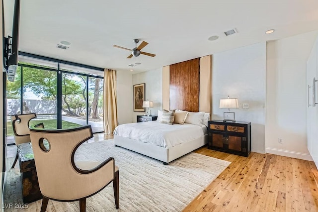 8525 W Verde Way, Las Vegas, NV 89149 - bedroom featuring light wood-style floors, access to exterior, and a ceiling fan