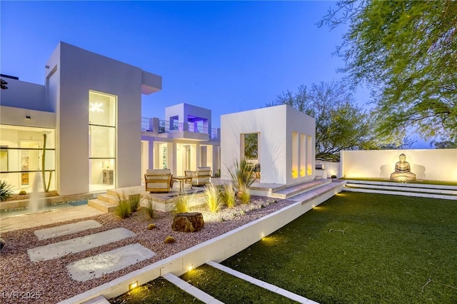 8525 W Verde Way, Las Vegas, NV 89149 - view of yard at twilight