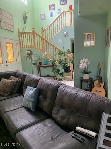 1385 Ringe Ln, Las Vegas, NV 89110 - living area with a towering ceiling and stairway