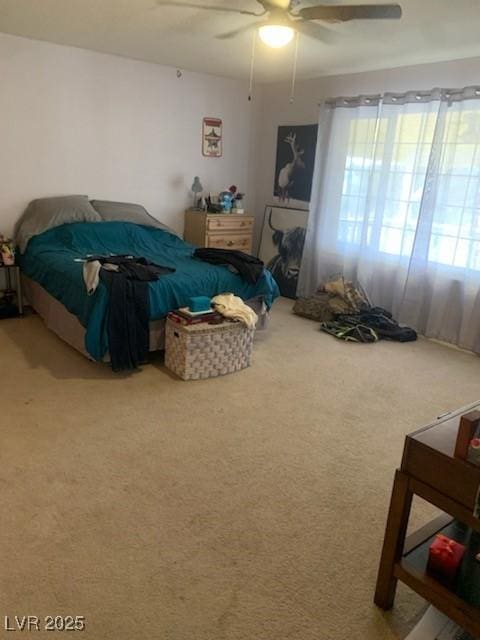 1385 Ringe Ln, Las Vegas, NV 89110 - bedroom with carpet floors and ceiling fan