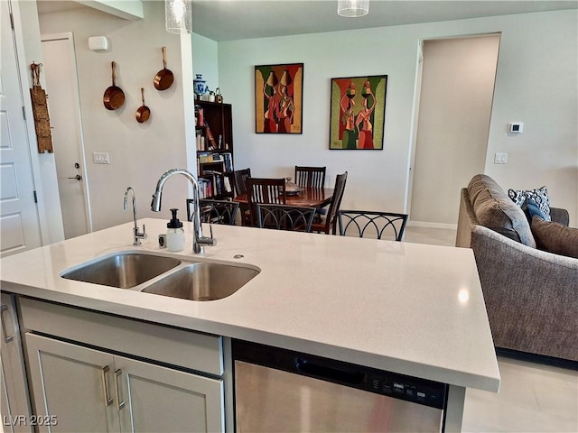 4286 E Cactus Canyon Dr, Pahrump, NV 89061 - kitchen with open floor plan, stainless steel dishwasher, light countertops, and a sink