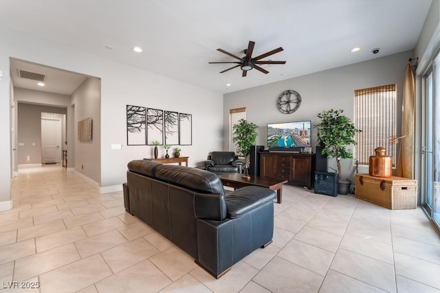 living area featuring ceiling fan, light tile patterned flooring, visible vents, and recessed lighting