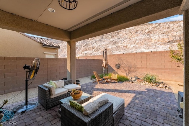 view of patio / terrace with a fenced backyard and an outdoor hangout area