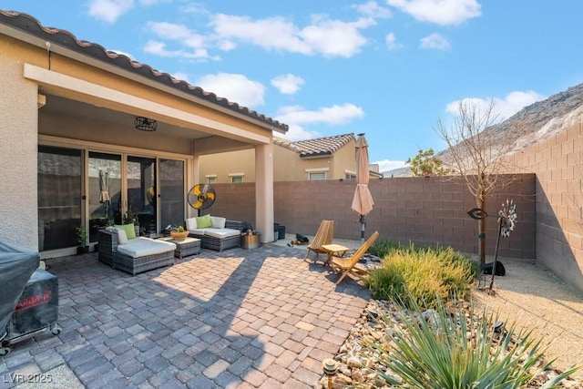 view of patio / terrace with a fenced backyard and an outdoor hangout area