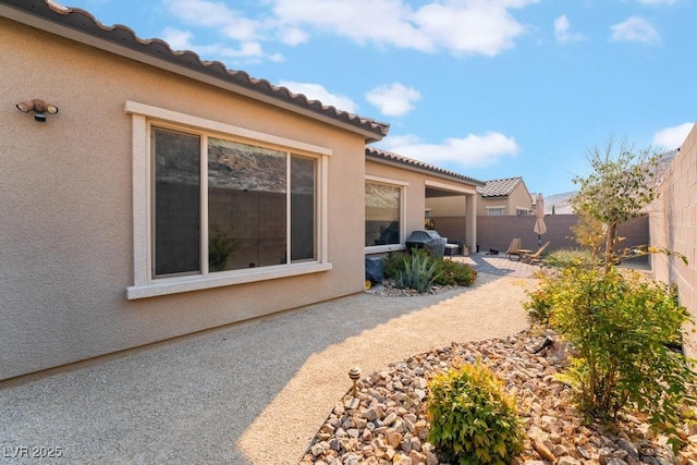 view of yard with a patio and fence