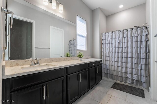 bathroom with vanity and tile patterned floors