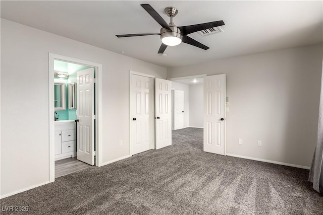 9604 Windom Point Ave, Las Vegas, NV 89129 - unfurnished bedroom featuring carpet, baseboards, and ensuite bath