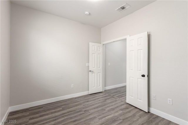 9604 Windom Point Ave, Las Vegas, NV 89129 - unfurnished bedroom with wood finished floors and baseboards