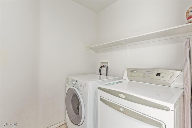 laundry area featuring laundry area and independent washer and dryer