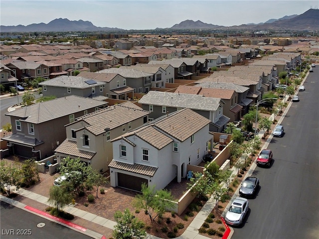 birds eye view of property featuring a residential view and a mountain view