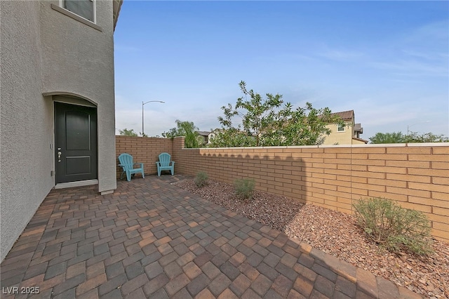 view of patio featuring a fenced backyard