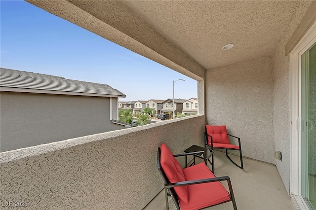 balcony featuring a residential view