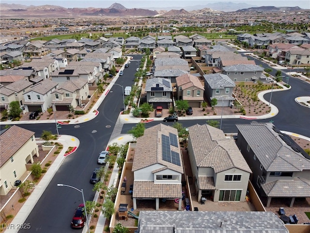 birds eye view of property featuring a mountain view and a residential view