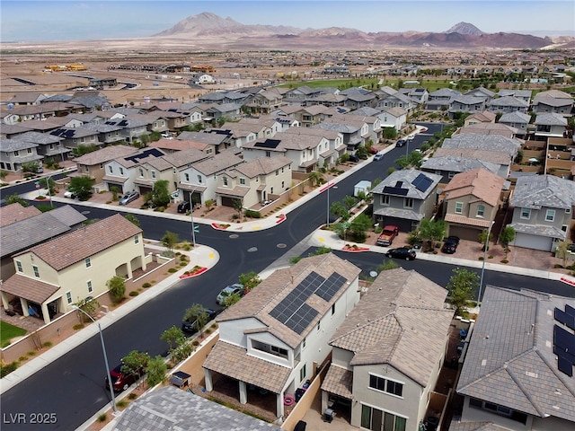 bird's eye view featuring a mountain view and a residential view