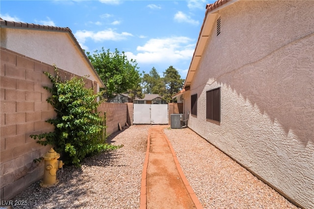 fenced backyard featuring cooling unit