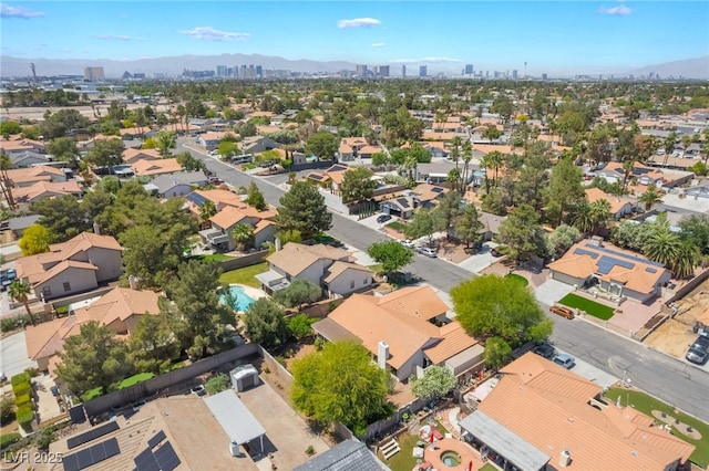 aerial perspective of suburban area featuring a skyline view