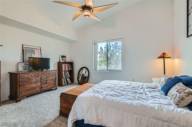 bedroom with lofted ceiling, carpet, and ceiling fan