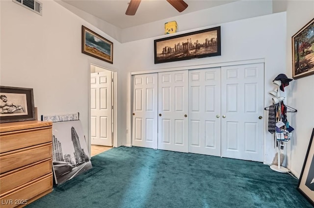 bedroom with visible vents, carpet, a closet, and ceiling fan