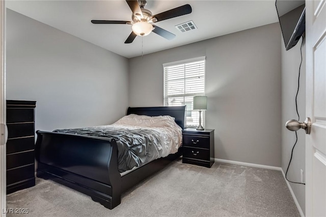 bedroom featuring baseboards, visible vents, carpet floors, and ceiling fan