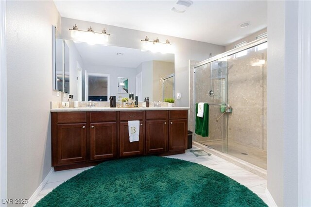 5409 Holding Ave, Las Vegas, NV 89139 - bathroom featuring a shower stall, a sink, carpet floors, double vanity, and tile patterned flooring
