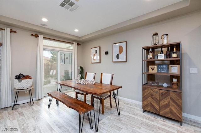 5409 Holding Ave, Las Vegas, NV 89139 - dining area featuring recessed lighting, light wood-type flooring, visible vents, and baseboards