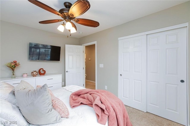 5409 Holding Ave, Las Vegas, NV 89139 - bedroom featuring ceiling fan, a closet, and light carpet