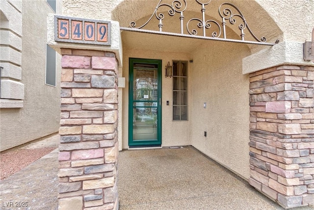 5409 Holding Ave, Las Vegas, NV 89139 - view of exterior entry with stucco siding