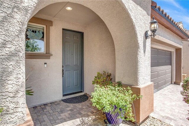 10976 Bluebell Basin Rd, Las Vegas, NV 89179 - view of exterior entry with stucco siding