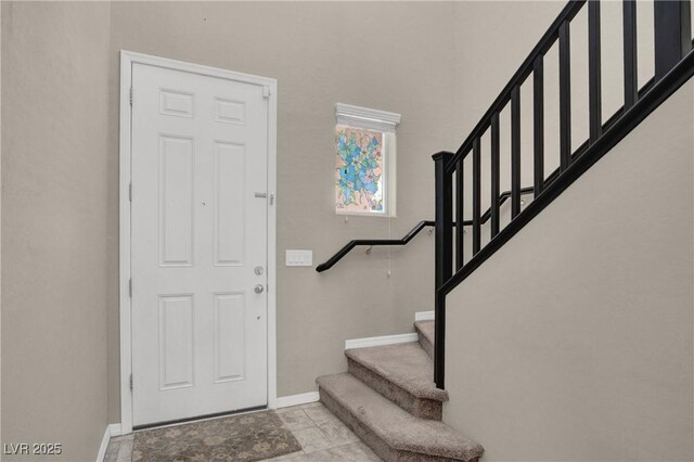 10976 Bluebell Basin Rd, Las Vegas, NV 89179 - foyer entrance featuring stairs and baseboards
