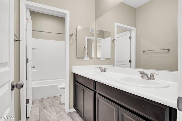 10976 Bluebell Basin Rd, Las Vegas, NV 89179 - full bath with double vanity, toilet, marble look tile flooring, and shower / bath combination