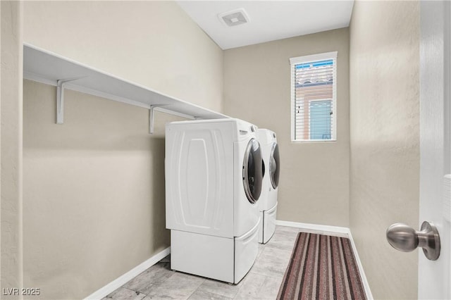 10976 Bluebell Basin Rd, Las Vegas, NV 89179 - laundry area featuring independent washer and dryer and baseboards