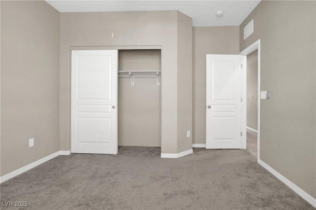 10976 Bluebell Basin Rd, Las Vegas, NV 89179 - unfurnished bedroom with carpet, a closet, and baseboards