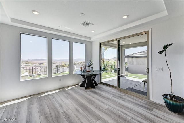 54 Mirage View Dr, Henderson, NV 89011 - dining area featuring a raised ceiling, wood finished floors, baseboards, and recessed lighting