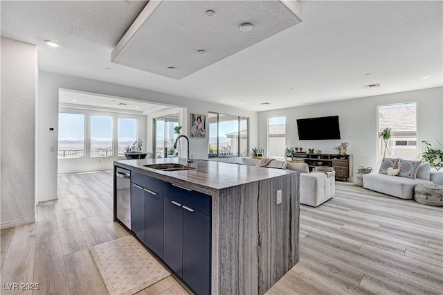 54 Mirage View Dr, Henderson, NV 89011 - kitchen featuring a sink, open floor plan, light wood-style flooring, and recessed lighting