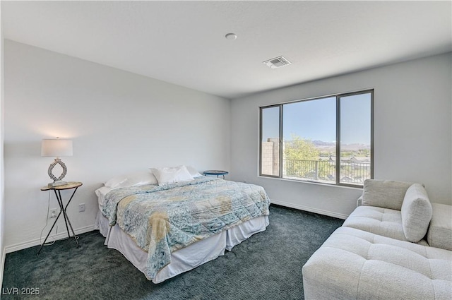 54 Mirage View Dr, Henderson, NV 89011 - bedroom with dark colored carpet and baseboards