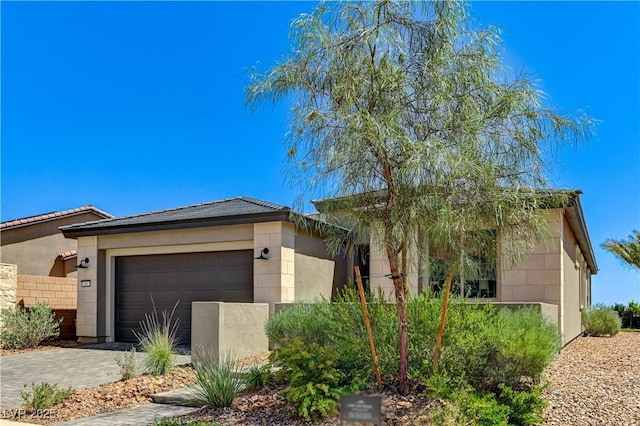 54 Mirage View Dr, Henderson, NV 89011 - ranch-style home with a garage, driveway, and stucco siding