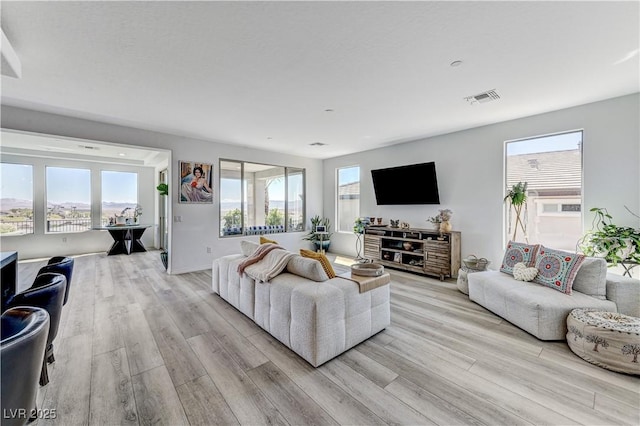 54 Mirage View Dr, Henderson, NV 89011 - living room featuring light wood finished floors