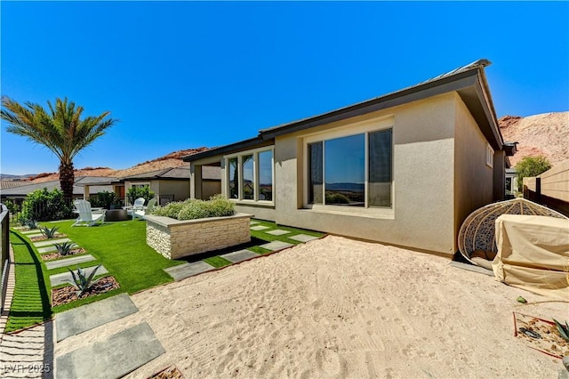 54 Mirage View Dr, Henderson, NV 89011 - back of house with stucco siding and a patio