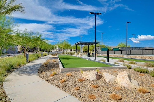 54 Mirage View Dr, Henderson, NV 89011 - view of property's community featuring a game area and fence