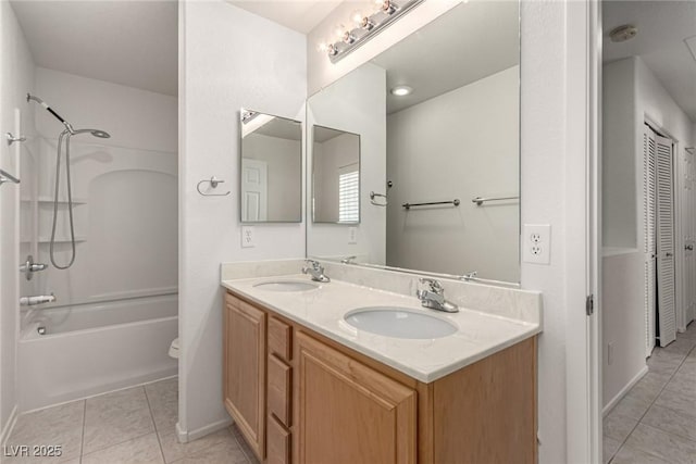 519 Brinkburn Point Ave, Las Vegas, NV 89178 - bathroom featuring tile patterned flooring, a sink, and shower / bathing tub combination