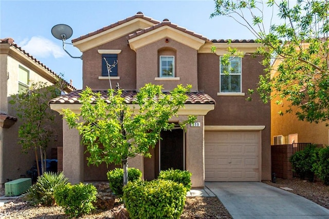 519 Brinkburn Point Ave, Las Vegas, NV 89178 - mediterranean / spanish-style home with an attached garage, a tile roof, stucco siding, and driveway