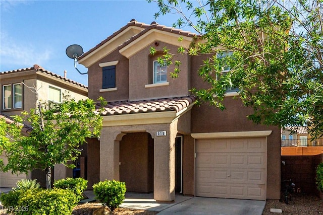 519 Brinkburn Point Ave, Las Vegas, NV 89178 - mediterranean / spanish-style home featuring stucco siding, a tile roof, concrete driveway, and an attached garage