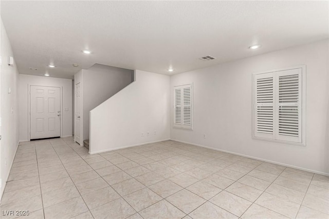 519 Brinkburn Point Ave, Las Vegas, NV 89178 - spare room with recessed lighting, visible vents, baseboards, and light tile patterned floors