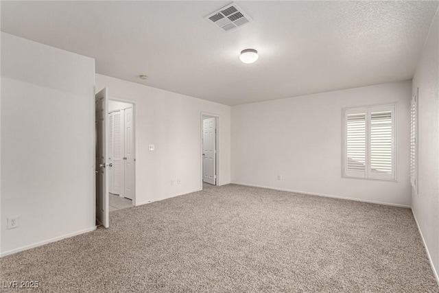 519 Brinkburn Point Ave, Las Vegas, NV 89178 - spare room with carpet flooring, visible vents, and baseboards
