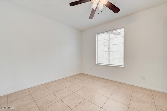2377 Los Feliz St, Las Vegas, NV 89156 - unfurnished room featuring baseboards, light tile patterned flooring, and ceiling fan